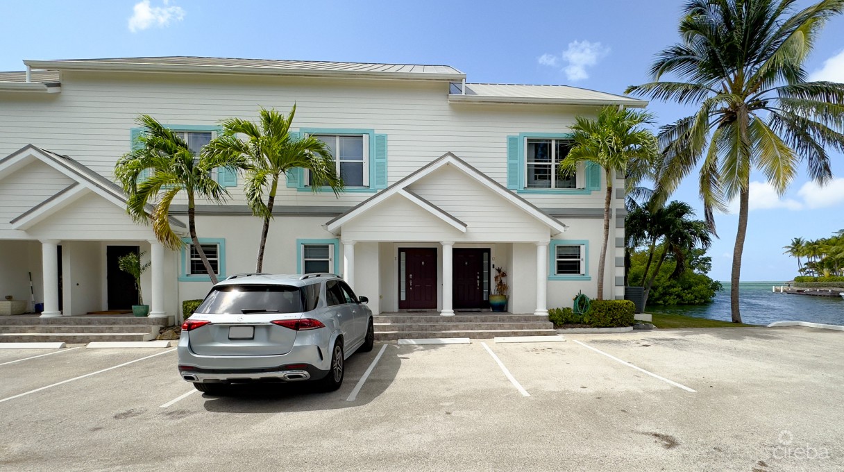 Coastal Escape Waterfront Townhouse - Image 1