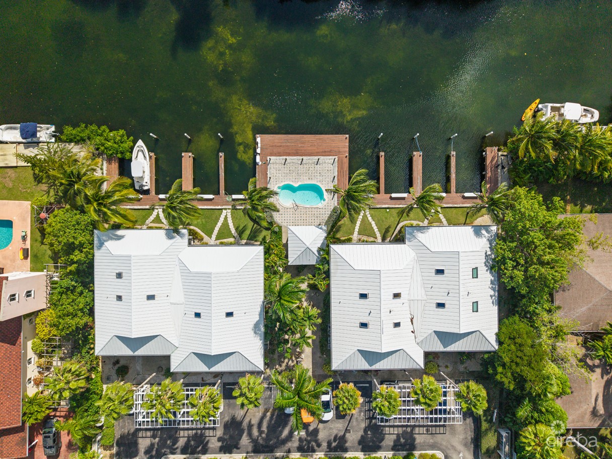 The Moorings, Stunning Canal Front Townhome, 3 Bed 3.5 Bathroom With Gorgeous Views Of The Canal - Image 1