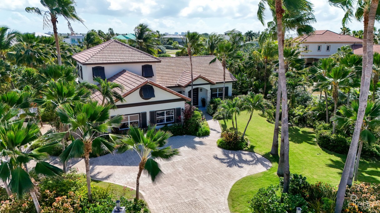 Fully Renovated 4-bed Canal Front Home With Den & Dock | The Shores