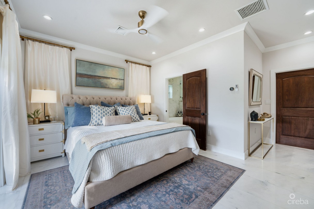 Fully Renovated 4-bed Canal Front Home With Den & Dock | The Shores - Image 11