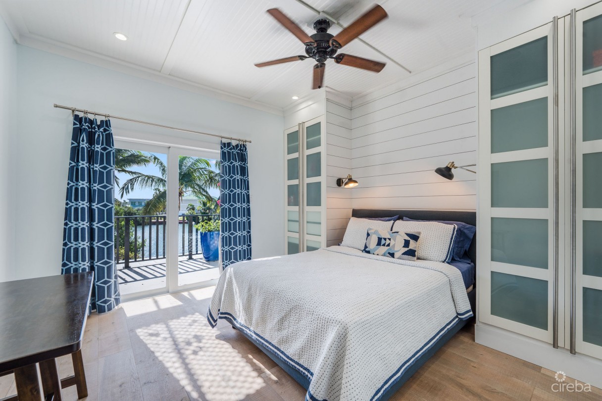 Fully Renovated 4-bed Canal Front Home With Den & Dock | The Shores - Image 14