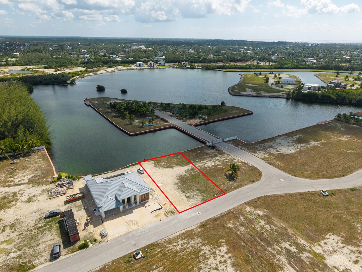 0.24 Acre Canal Lot In Gated Community - Mustique Cove - Image 3