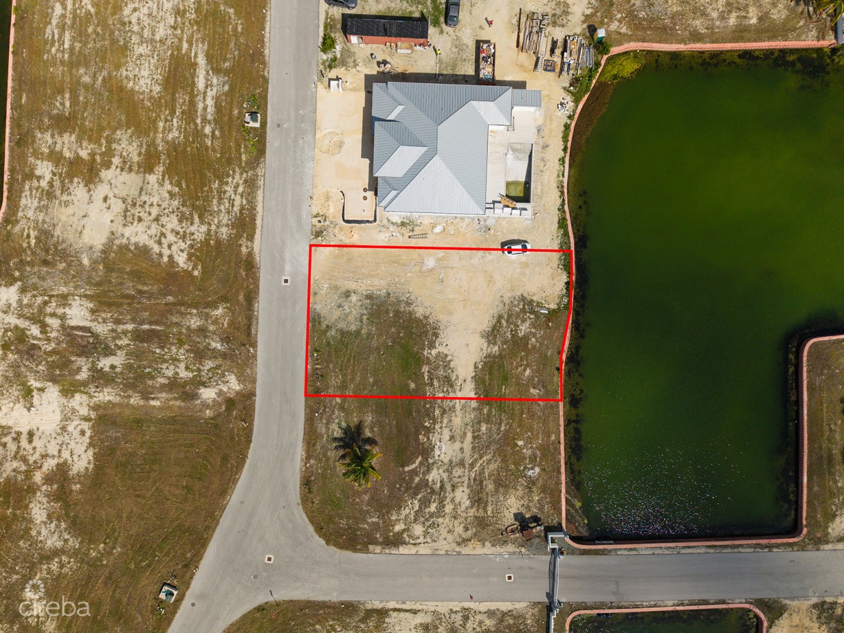 0.24 Acre Canal Lot In Gated Community - Mustique Cove - Image 2