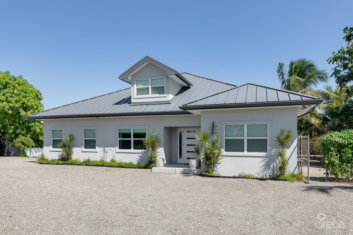 Elevated, 6-bedroom  Single Family Home On A Massive Parcel