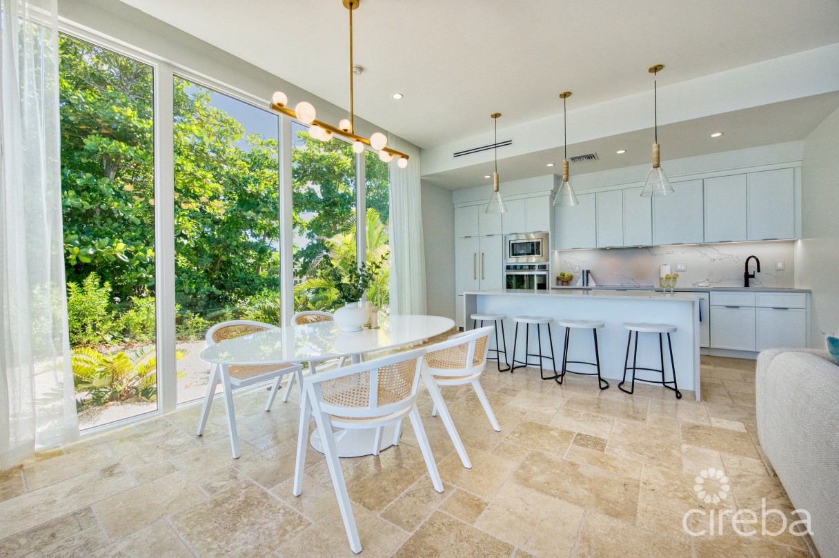 Seaside Hideaway - Fully Renovated Beachfront Gem - Image 5