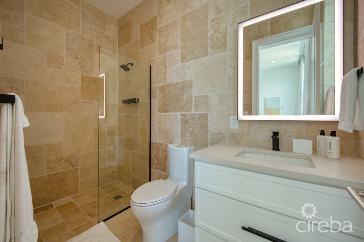 Seaside Hideaway - Fully Renovated Beachfront Gem - Image 7