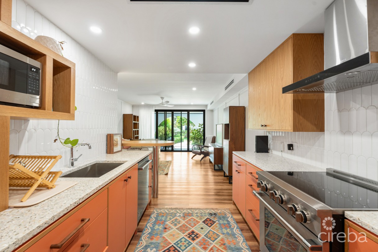 Villa Pappagallos 4, West Bay Renovated Condo - Image 2
