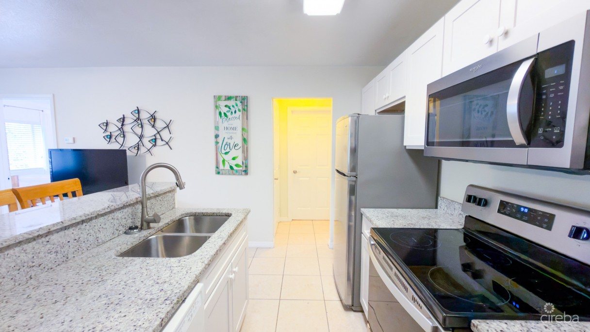 Lakeside K36 Renovated 2 Bedroom Condo Opposite Camana Bay - Image 4