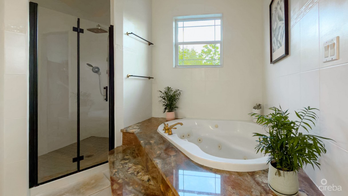 Sun Rose Canal Front Home - North Sound Estates - Image 11